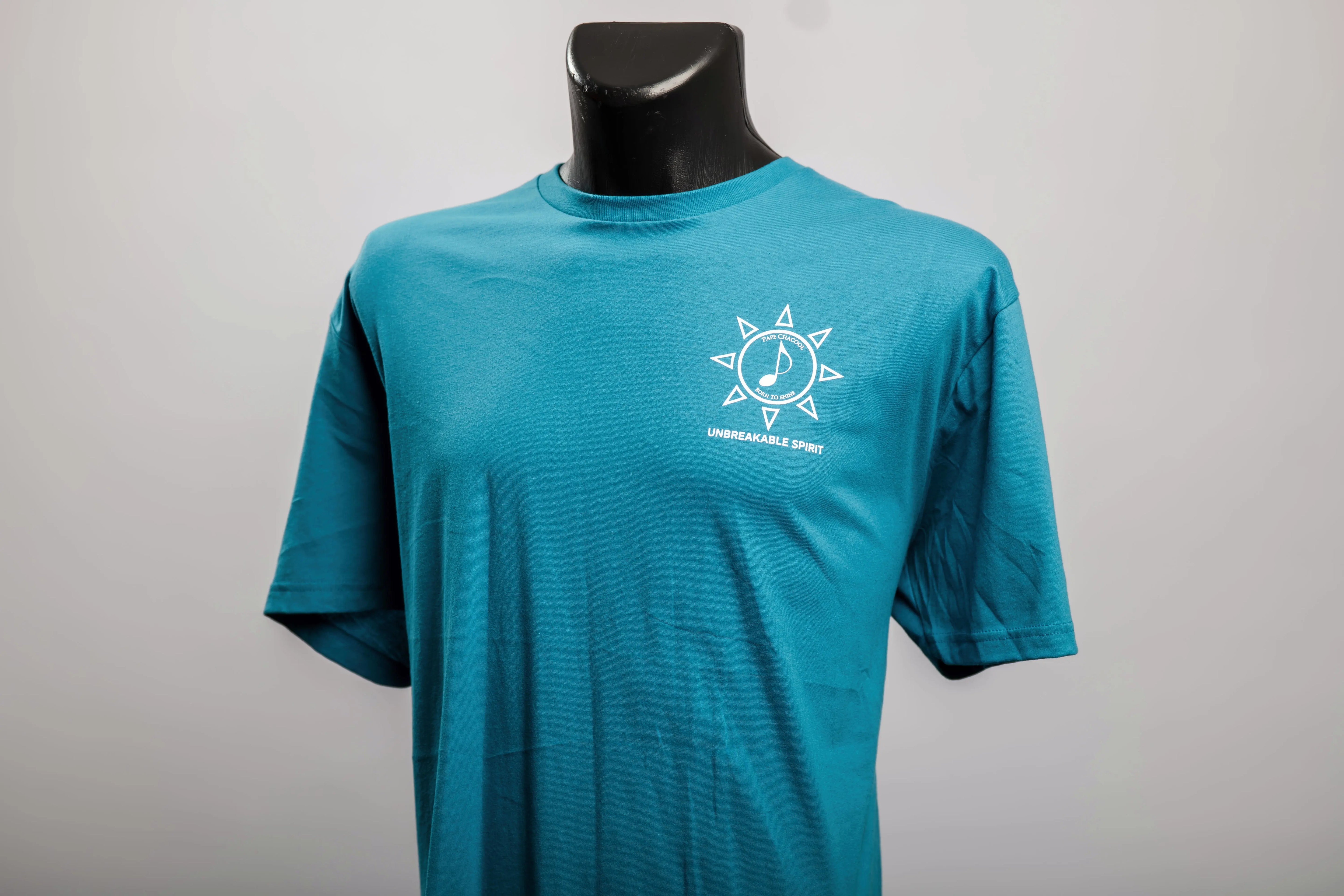 Unbreakable Spirit Tee – Teal Wave Pape Chacool