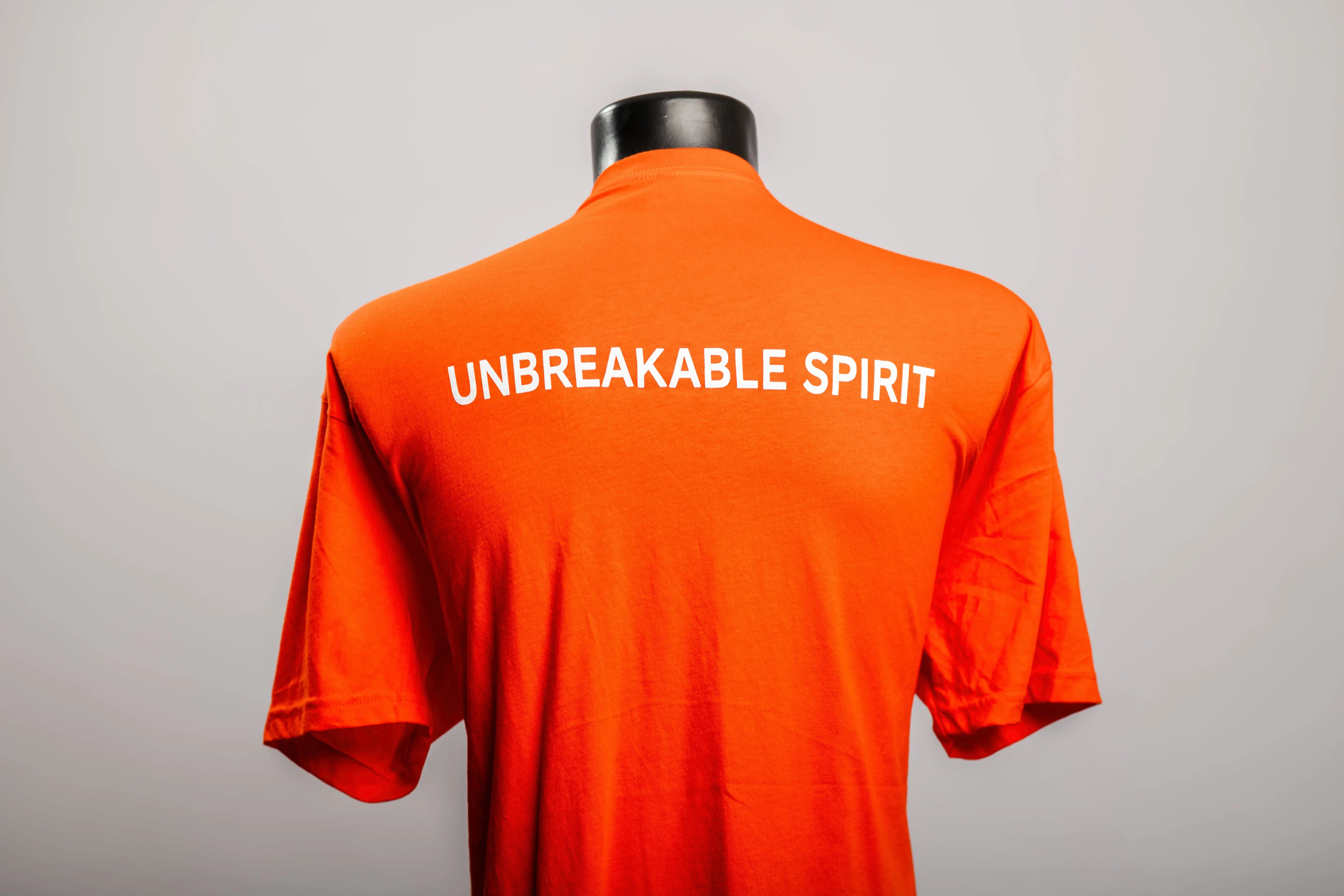 Unbreakable Spirit Tee – Orange Pape Chacool